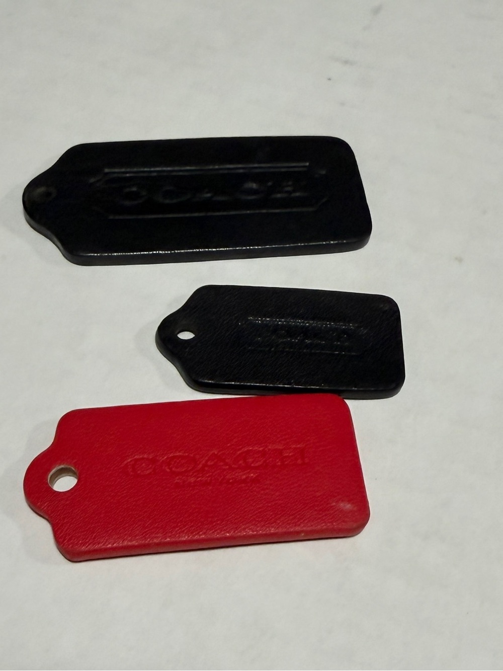COACH Leather Tag Set - Black & Red Phone Accessory
